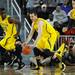 Michigan freshman Nik Stauskas moves the ball down the court as teammate junior Tim Hardaway Jr. looks on during the first half against North Carolina State at Crisler Center on Tuesday night. Melanie Maxwell I AnnArbor.com